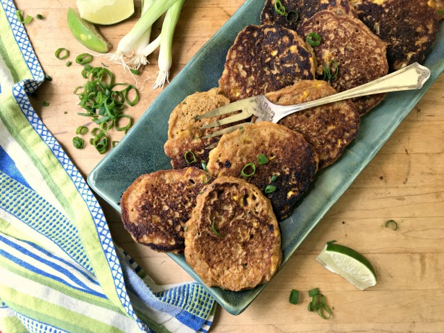 Lightly spiced and filled with herbs, molasses corn fritters suit breakfast and supper. 
