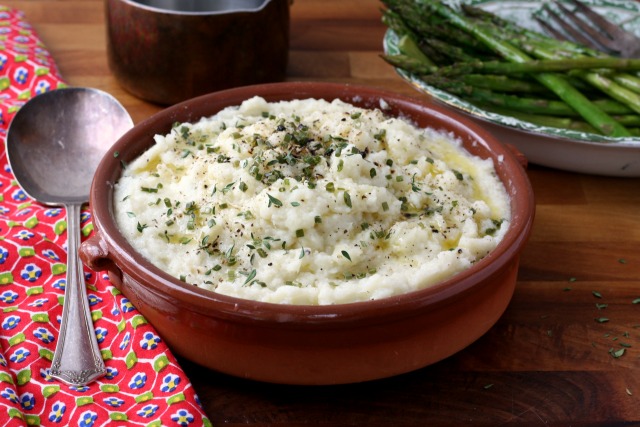 Slightly garlicky cauliflower mash is a good alternative to mashed potatoes. Healthier and much simpler to make this is one of those recipes that goes with almost everything. 