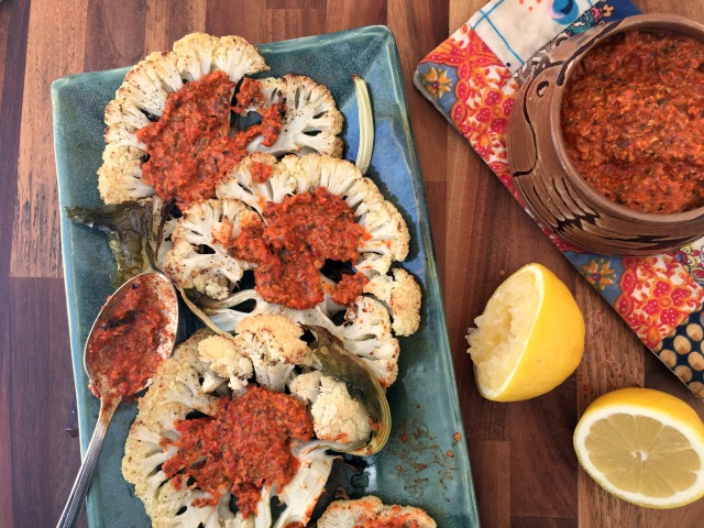 Pumpkin seed Romesco sauce served on roasted cauliflower steaks makes vegetables the star of the meal. 