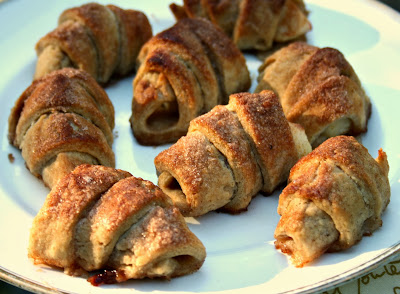 apple twists: apple wedges wrapped in a buttery spelt flour pastry and baked in cinnamon sugar syrup