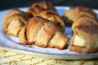 apple twists: apple wedges wrapped in a buttery spelt flour pastry and baked in cinnamon sugar syrup